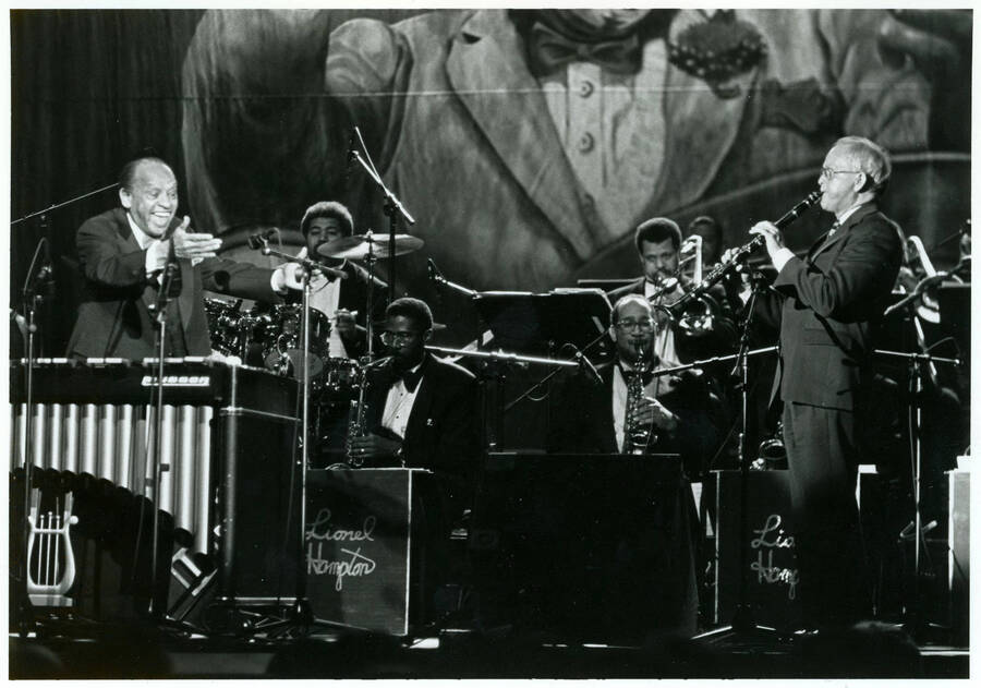 7" x 5" black and white photograph. Lionel Hampton and his band perform with unidentified clarinetist at the Lionel Hampton Jazz Festival.