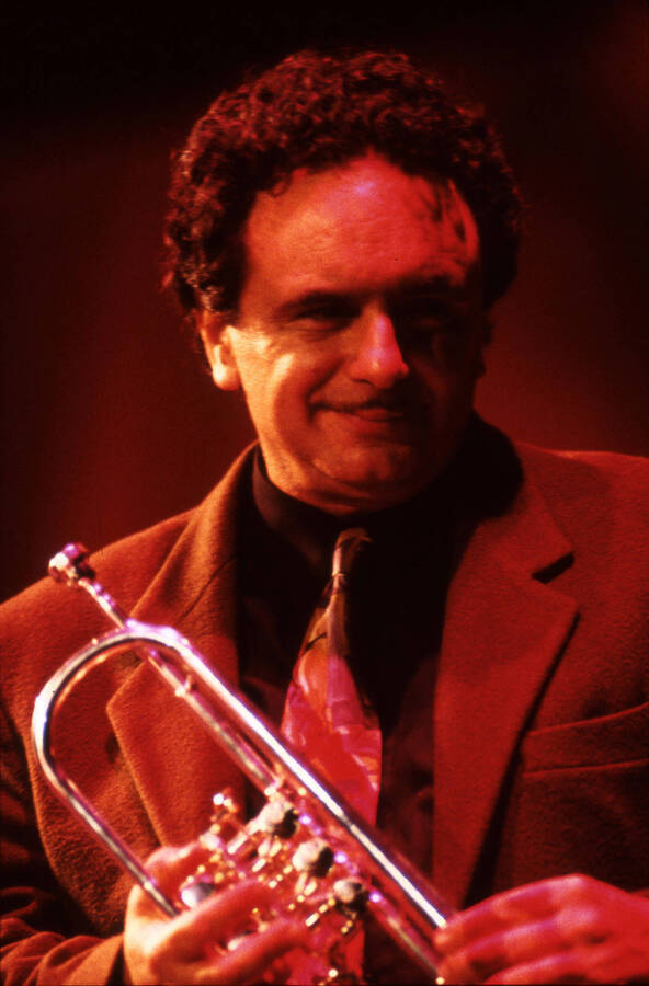 35 mm color slide. Claudio Roditi holds a trumpet on stage at the Pepsi International World Jazz Night at the 1992 Lionel Hampton-Chevron Jazz Festival.