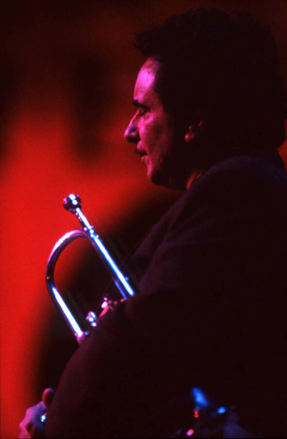 35 mm color slide. Claudio Roditi stands with a trumpet under his arm at the Pepsi International World Jazz Night at the 1992 Lionel Hampton-Chevron Jazz Festival.