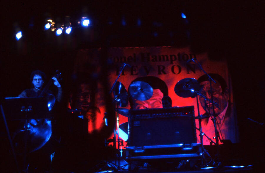 35mm color slide. Brian Bromberg and Wally "Gator" Watson playing at the Pepsi International World Jazz Night at the 1992 Lionel Hampton-Chevron Jazz Festival.