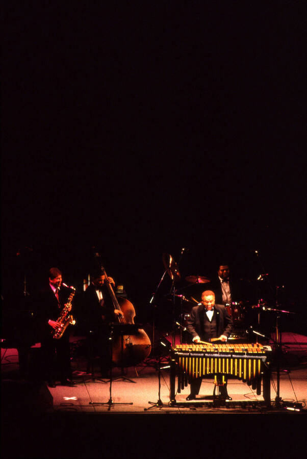 35 mm color slide. Lionel Hampton, Lembit Saarsalu, Leon Dorsey, and Wally "Gator" Watson perform at the Pepsi International World Jazz Night at the 1992 Lionel Hampton-Chevron Jazz Festival evening concert.
