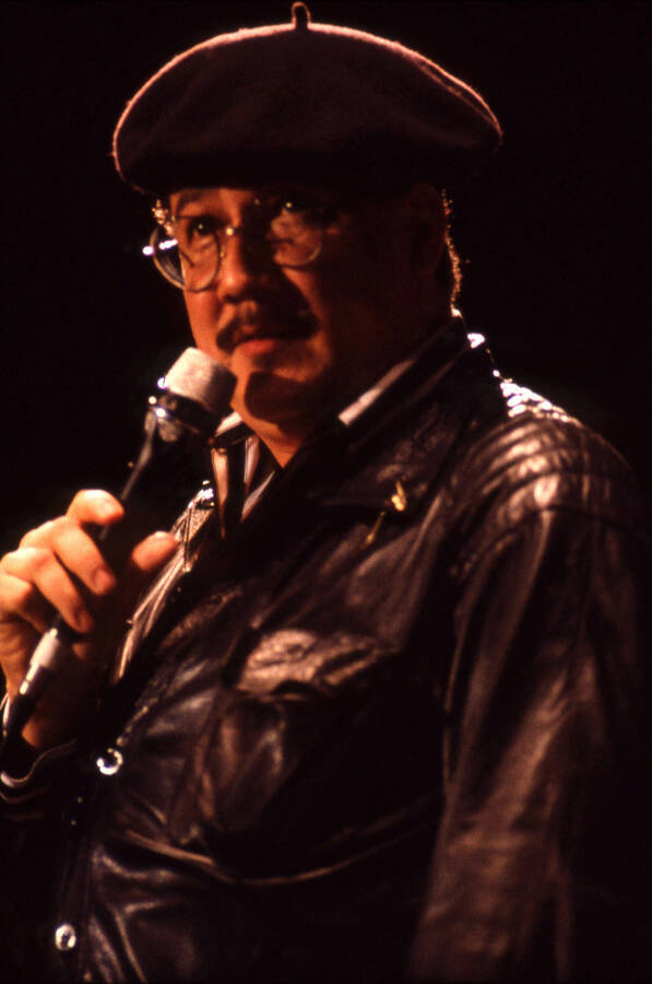 35mm color slide. Paquito D'Rivera speaks into a microphone on stage at the Pepsi International World Jazz Night at the 1992 Lionel Hampton-Chevron Jazz Festival.