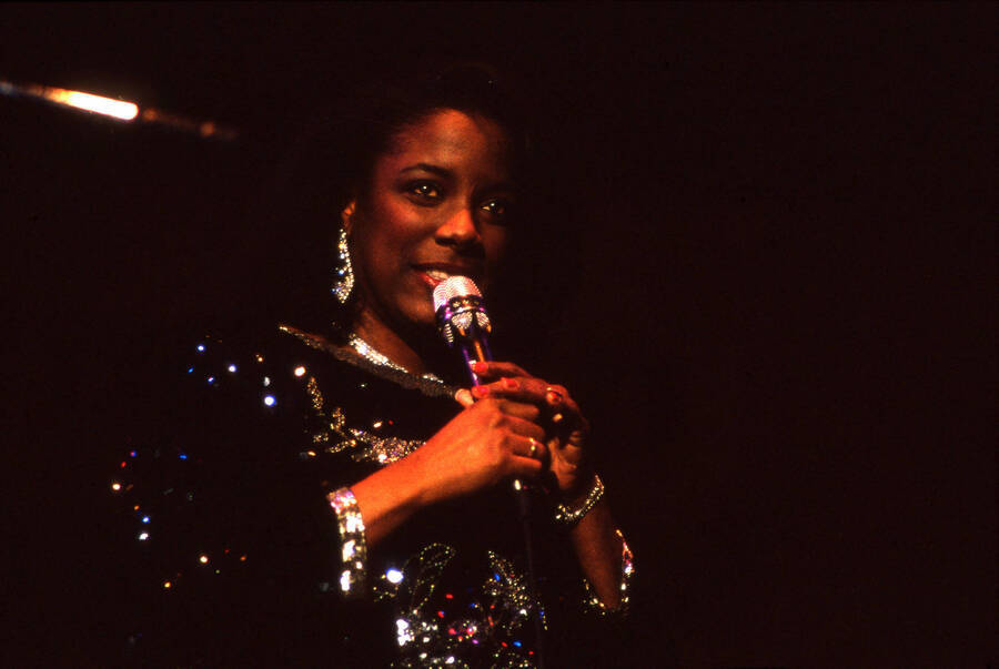 35 mm color slide. Kim Foley sings on stage at the Pepsi International World Jazz Night at the 1992 Lionel Hampton-Chevron Jazz Festival.