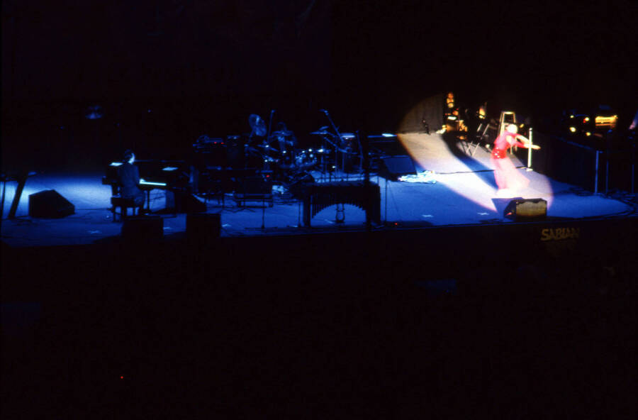 35 mm color slide. Kao Temma dances with a spotlight on her at the Pepsi International World Jazz Night at the 1992 Lionel Hampton-Chevron Jazz Festival.
