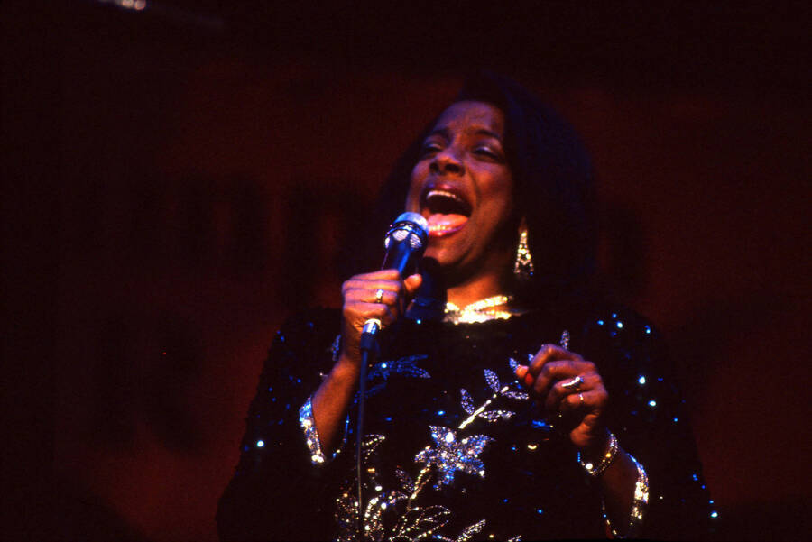 35 mm color slide. Kim Foley sings on stage at the Pepsi International World Jazz Night at the 1992 Lionel Hampton-Chevron Jazz Festival.