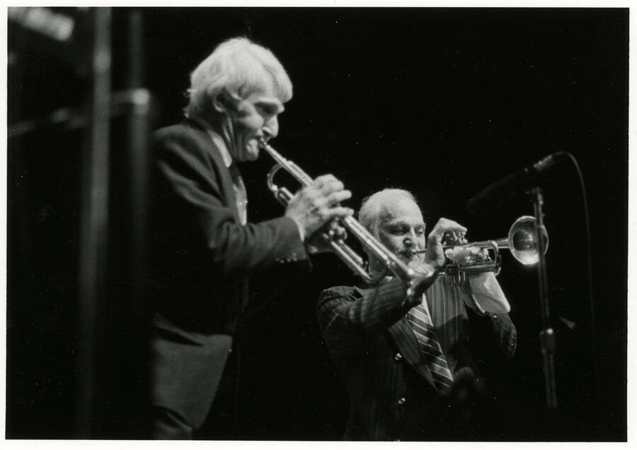 7"x5" black and white photograph. Pete and Conte Candoli playing trumpets together at the Lionel Hampton Jazz Festival.