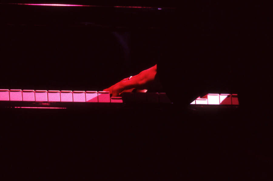 35 mm color slide. Close up of Kuni Mikami's hand playing the piano at the Pepsi International World Jazz Night at the 1992 Lionel Hampton-Chevron Jazz Festival.