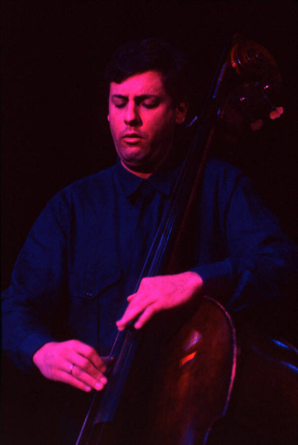 35 mm color slide. David Finck plays bass at the Pepsi International World Jazz Night at the 1992 Lionel Hampton-Chevron Jazz Festival.