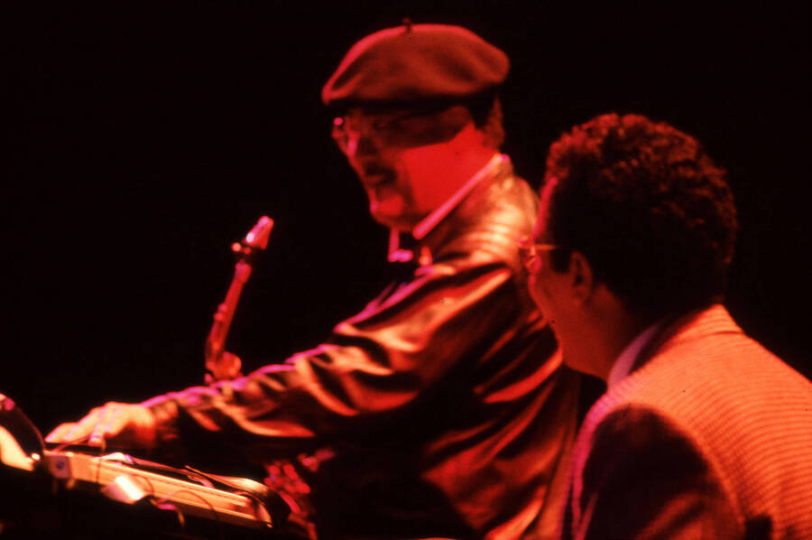 35mm color slide. Paquito D'Rivera and Danilo Perez smile on stage at the Pepsi International World Jazz Night at the 1992 Lionel Hampton-Chevron Jazz Festival.