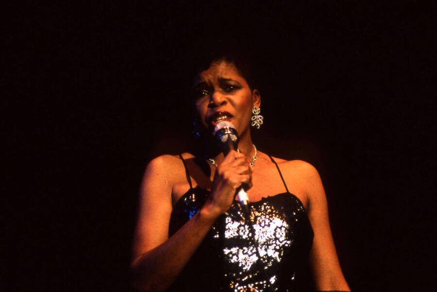 35 mm color slide. Lisa Capers sings on stage at the Pepsi International World Jazz Night at the 1992 Lionel Hampton-Chevron Jazz Festival.