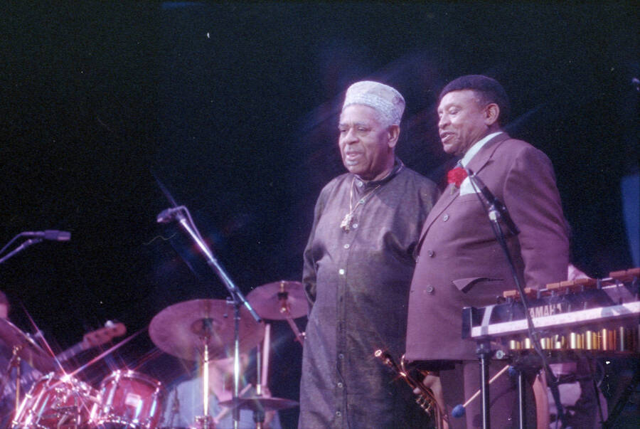 35mm color negative. Lionel Hampton and Dizzy Gillespie stand on stage at the 1991 Lionel Hampton-Chevron Jazz Festival.