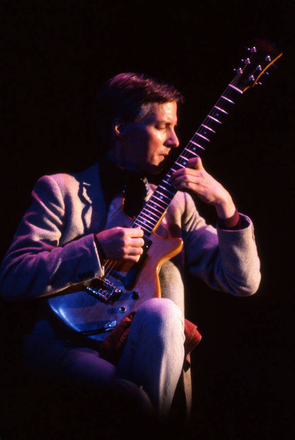 35 mm color slide. John Stowell plays guitar at Pepsi International World Jazz Night at the 1992 Lionel Hampton-Chevron Jazz Festival.