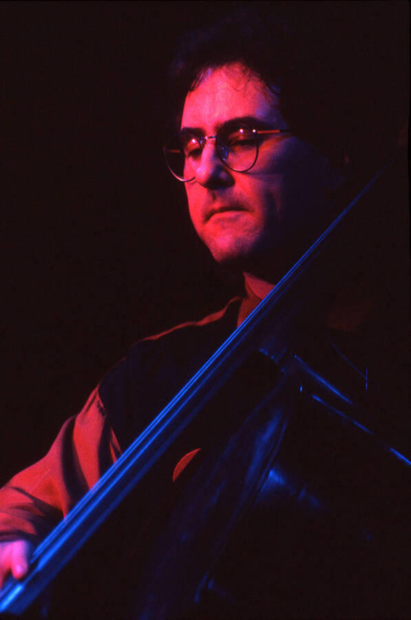 35mm color slide. Brian Bromberg plays bass at the Pepsi International World Jazz Night at the 1992 Lionel Hampton-Chevron Jazz Festival.