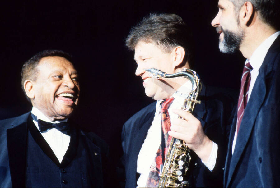 35 mm color slide. Close up of Lionel Hampton, Lembit Saarsalu, and Leonid Vintskevich on stage at the Pepsi International World Jazz Night at the 1992 Lionel Hampton-Chevron Jazz Festival.