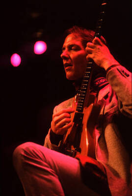 35 mm color slide. John Stowell plays guitar at the Pepsi International World Jazz Night at the 1992 Lionel Hampton-Chevron Jazz Festival.