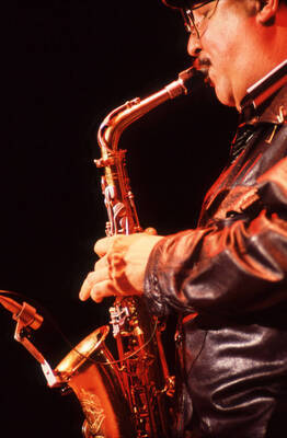 35mm color slide. Paquito D'Rivera plays saxophone at the Pepsi International World Jazz Night at the 1992 Lionel Hampton-Chevron Jazz Festival.