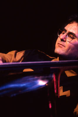 35mm color slide. Brian Bromberg plays bass at the Pepsi International World Jazz Night at the 1992 Lionel Hampton-Chevron Jazz Festival.