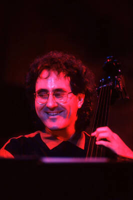 35mm color slide. Brian Bromberg plays bass at the Pepsi International World Jazz Night at the 1992 Lionel Hampton-Chevron Jazz Festival.