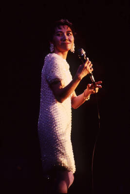 35 mm color slide. Reiko Aoki sings at the Pepsi International World Jazz Night at the 1992 Lionel Hampton-Chevron Jazz Festival.