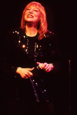 35 mm color slide. Gail Wynters smiles on stage at the Pepsi International World Jazz Night at the 1992 Lionel Hampton-Chevron Jazz Festival.