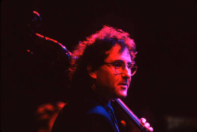 35mm color slide. Brian Bromberg plays bass at the Pepsi International World Jazz Night at the 1992 Lionel Hampton-Chevron Jazz Festival.