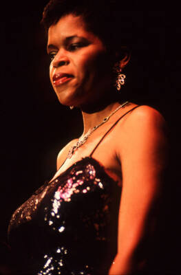 35 mm color slide. Lisa Capers on stage at the Pepsi International World Jazz Night at the 1992 Lionel Hampton-Chevron Jazz Festival.