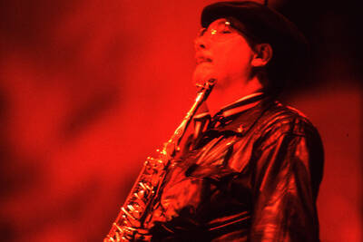 35mm color slide. Paquito D'Rivera stands on stage at the Pepsi International World Jazz Night at the 1992 Lionel Hampton-Chevron Jazz Festival.