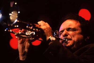 35mm color slide. Claudio Roditi plays trumpet at the Pepsi International World Jazz Night at the 1992 Lionel Hampton-Chevron Jazz Festival.