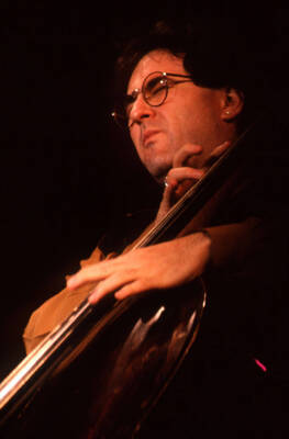 35mm color slide. Brian Bromberg plays bass at the Pepsi International World Jazz Night at the 1992 Lionel Hampton-Chevron Jazz Festival.
