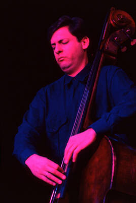 35 mm color slide. David Finck plays bass at the Pepsi International World Jazz Night at the 1992 Lionel Hampton-Chevron Jazz Festival.