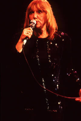 35 mm color slide. Gail Wynters sings on stage at the Pepsi International World Jazz Night at the 1992 Lionel Hampton-Chevron Jazz Festival.