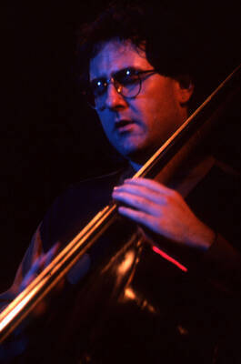 35mm color slide. Brian Bromberg plays bass at the Pepsi International World Jazz Night at the 1992 Lionel Hampton-Chevron Jazz Festival.