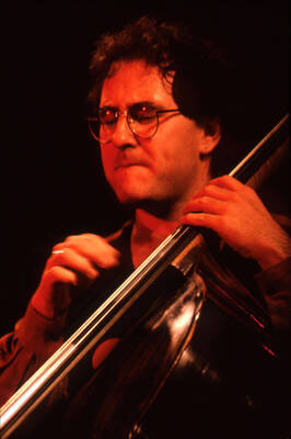 35mm color slide. Brian Bromberg plays bass at the Pepsi International World Jazz Night at the 1992 Lionel Hampton-Chevron Jazz Festival.