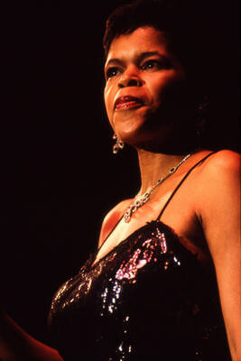 35 mm color slide. Lisa Capers on stage at the Pepsi International World Jazz Night at the 1992 Lionel Hampton-Chevron Jazz Festival.