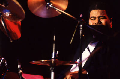 35 mm color slide. Wally "Gator" Watson plays drums at the Pepsi International World Jazz Night at the 1992 Lionel Hampton-Chevron Jazz Festival.