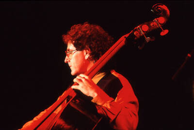 35mm color slide. Brian Bromberg plays bass at the Pepsi International World Jazz Night at the 1992 Lionel Hampton-Chevron Jazz Festival.