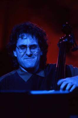 35mm color slide. Brian Bromberg plays bass at the Pepsi International World Jazz Night at the 1992 Lionel Hampton-Chevron Jazz Festival.