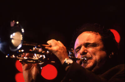 35mm color slide. Claudio Roditi plays trumpet at the Pepsi International World Jazz Night at the 1992 Lionel Hampton-Chevron Jazz Festival.
