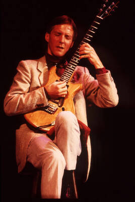 35 mm color slide. John Stowell plays guitar at the Pepsi International World Jazz Night at the 1992 Lionel Hampton-Chevron Jazz Festival.