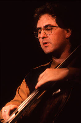 35mm color slide. Brian Bromberg plays bass at the Pepsi International World Jazz Night at the 1992 Lionel Hampton-Chevron Jazz Festival.