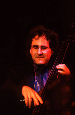 35mm color slide. Brian Bromberg plays bass at the Pepsi International World Jazz Night at the 1992 Lionel Hampton-Chevron Jazz Festival.