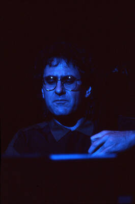 35mm color slide. Brian Bromberg plays bass at the Pepsi International World Jazz Night at the 1992 Lionel Hampton-Chevron Jazz Festival.