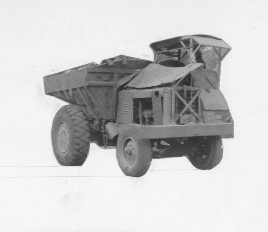 Image of construction equipment vehicle at Kooskia Interment Camp. Photo taken from 12-3/4 x 15-1/4 Photograph album of the Kooskia Japanese Internment Camp.