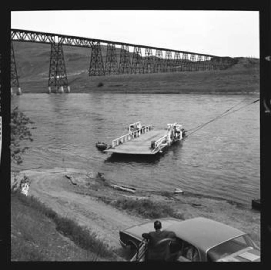 View of the Union Pacific trestle and a car ferry on the Snake Rive at Lyons Ferry.