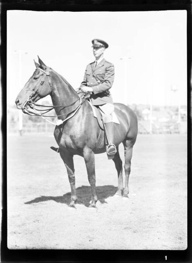 Harry Brenn riding horseback.