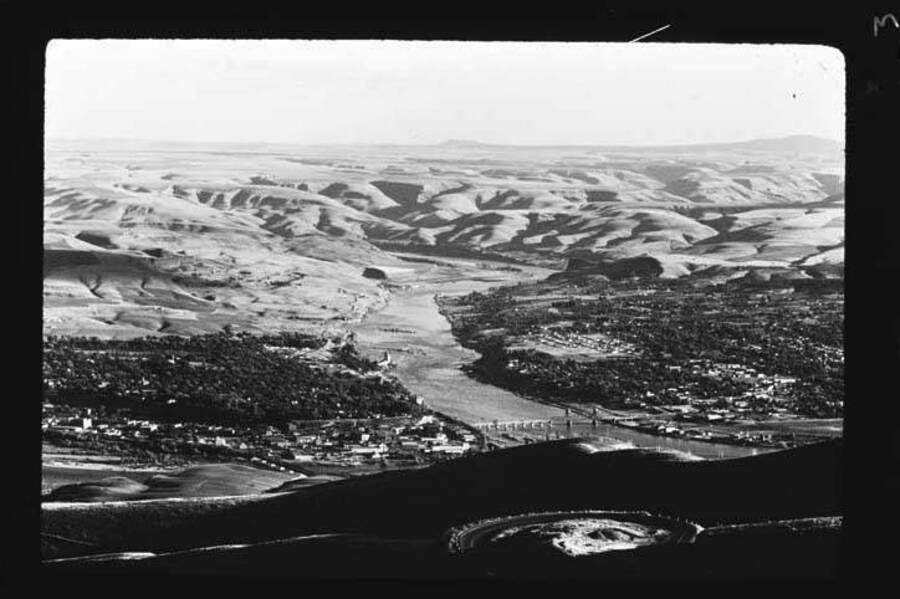 Image shows the cities of Lewiston and Clarkston, and the Clearwater and Snake Rivers from the top of the ridge.