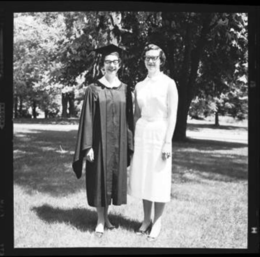Kay Laughlin with unidentified woman on her graduation from the University of Idaho.