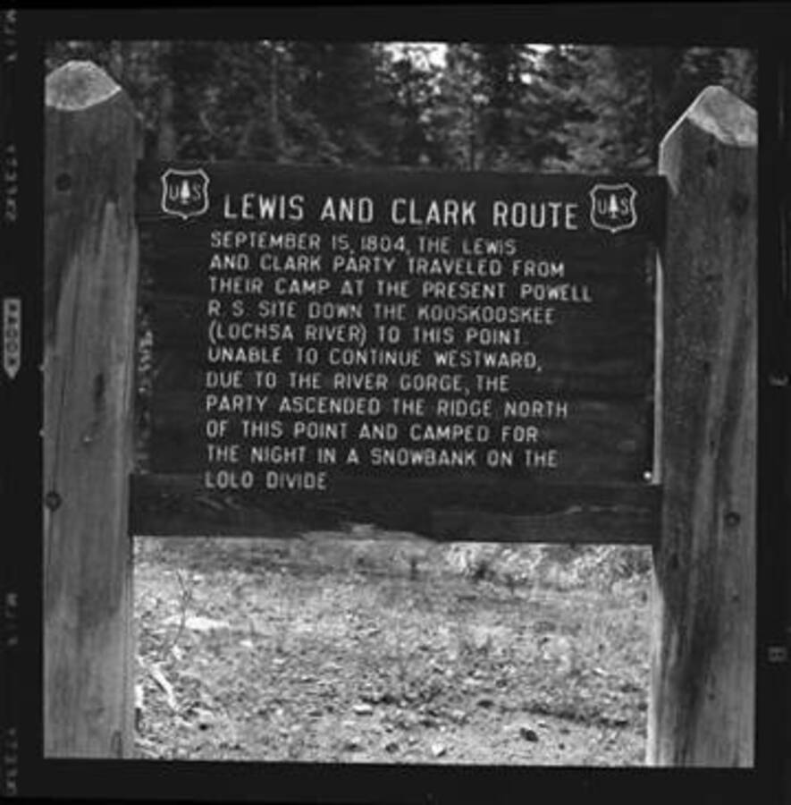 Three signs, one which reads 'Postoffice Creek pack camp'