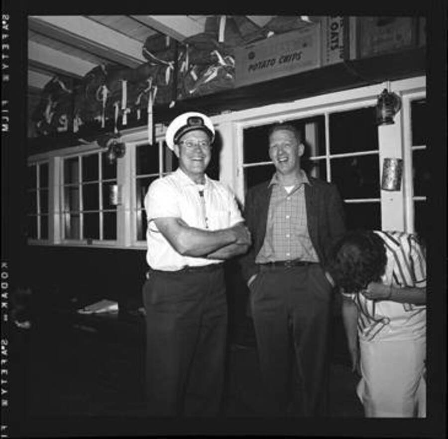 John Finney with unidentified man at dance at Lake Coeur D'Alene.