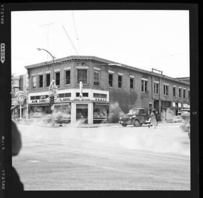 View of a corner drugstore (has Gem in the name).